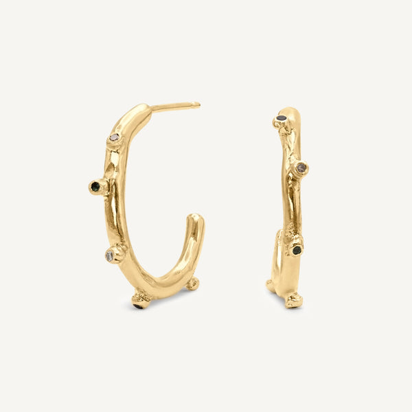 Rough yet refined bobble hoop earrings set with diamonds and tourmaline gemstones. Handmade using solid 14ct yellow gold in Robyn's South London studio.