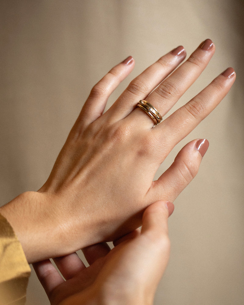 Unique and playful, this solid 14ct gold bobble ring is set with ethically sourced diamonds and tourmaline gemstones. Handmade in South London using 100% recycled precious metal.