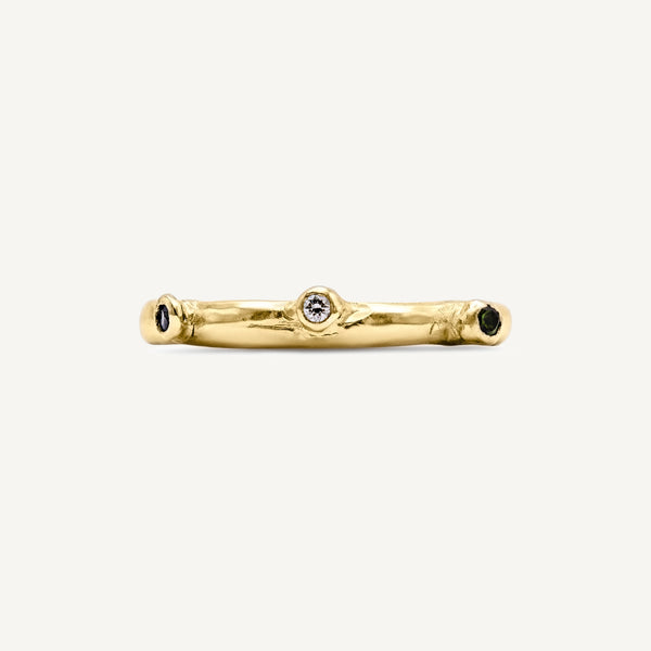 Unique and playful, this solid 14ct gold bobble ring is set with ethically sourced diamonds and tourmaline gemstones. Handmade in South London using 100% recycled precious metal.