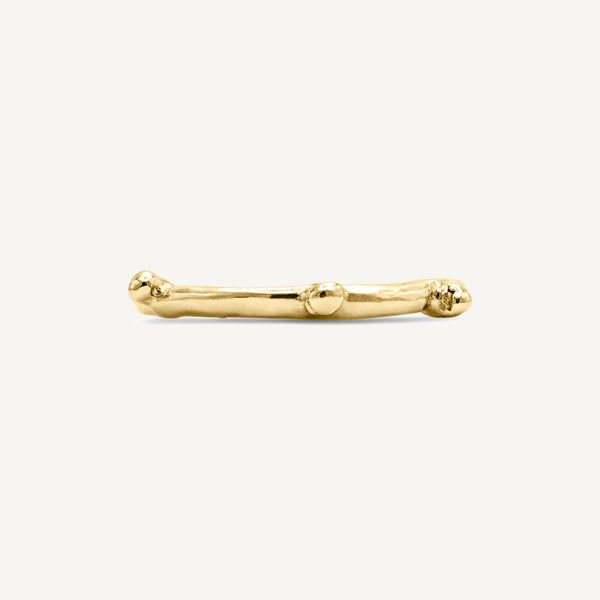 Rough, textured, alternative solid 14ct yellow gold stacking bobble ring with a polished surface. Hadmade in Robyn's South London workshop using 100% recycled gold.