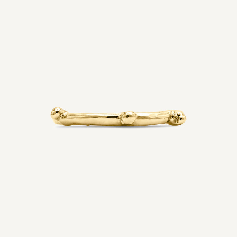 Rough, textured, alternative solid 14ct yellow gold stacking bobble ring with a polished surface. Hadmade in Robyn's South London workshop using 100% recycled gold.