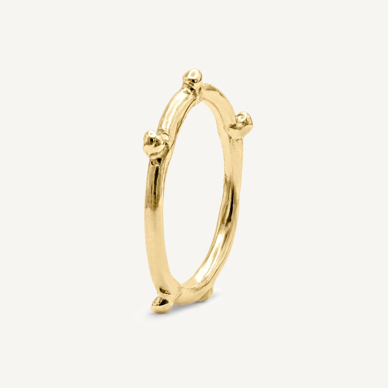 Rough, textured, alternative solid 14ct yellow gold stacking bobble ring with a polished surface. Hadmade in Robyn's South London workshop using 100% recycled gold.