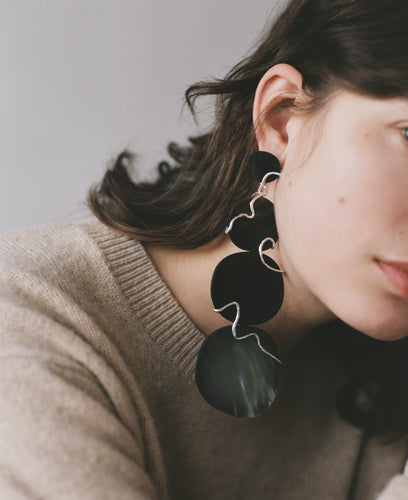The JACOPO earrings, from the collection Edition 08 made in collaboration with Birgit Toke Tauka Frietman. Ethically handmade in London using recycled silver and pressed horn.