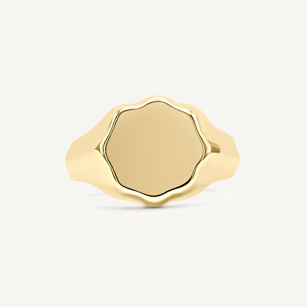 Floral flower signet ring made from solid 14ct yellow gold. Customisable with engraving or adding gemstones. Handmade in South London using 100% recycled precious metal.