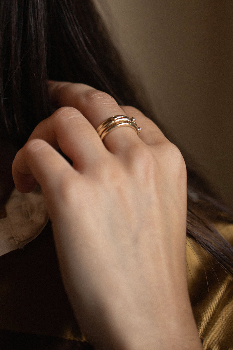 Rough, textured, alternative solid 14ct yellow gold stacking bobble ring with a polished surface. Hadmade in Robyn's South London workshop using 100% recycled gold.