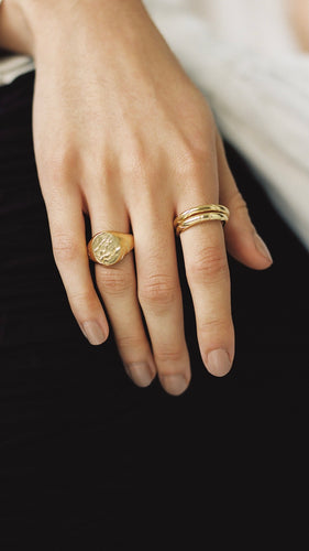 Textured gold Constans signet ring | statement jewellery where roughness and refinement coexist | rings, bracelets, earrings, necklaces, hairslides and bespoke fine jewellery all handcrafted in London from 100% recycled silver and gold plate