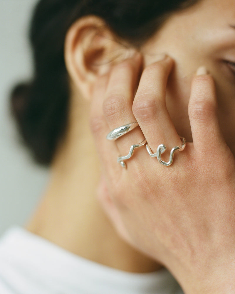 Textured chunky silver CLEMENTE ring with a tapered band, ethically handmade custom to your size in London using recycled silver.