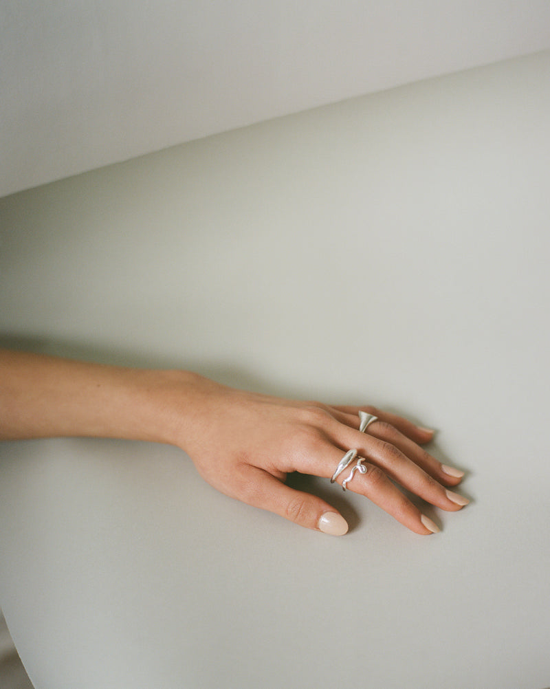 Textured chunky silver CLEMENTE ring with a tapered band, ethically handmade custom to your size in London using recycled silver.