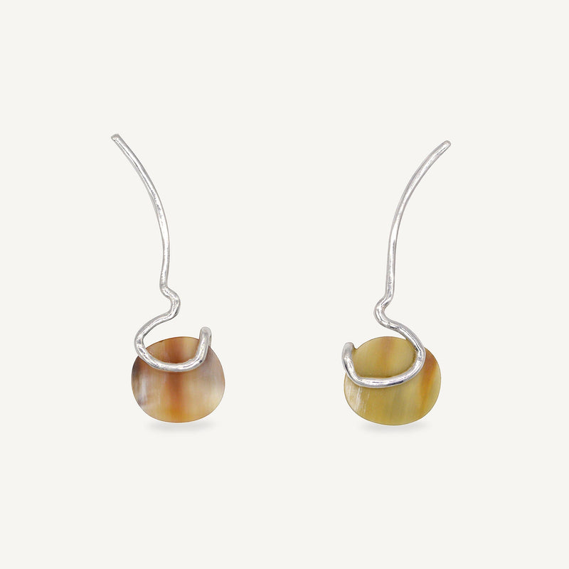Sculptural elegant silver earrings handcrafted by Robyn Smith for Folde Jewellery in London ethically handmade using recycled silver and highland horn.