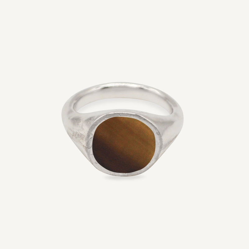 The RAY ring is a chunky silver and horn signet ring with organic textured silver finish ethically handmade in London from recycled silver by Robyn Smith for Folde Jewellery