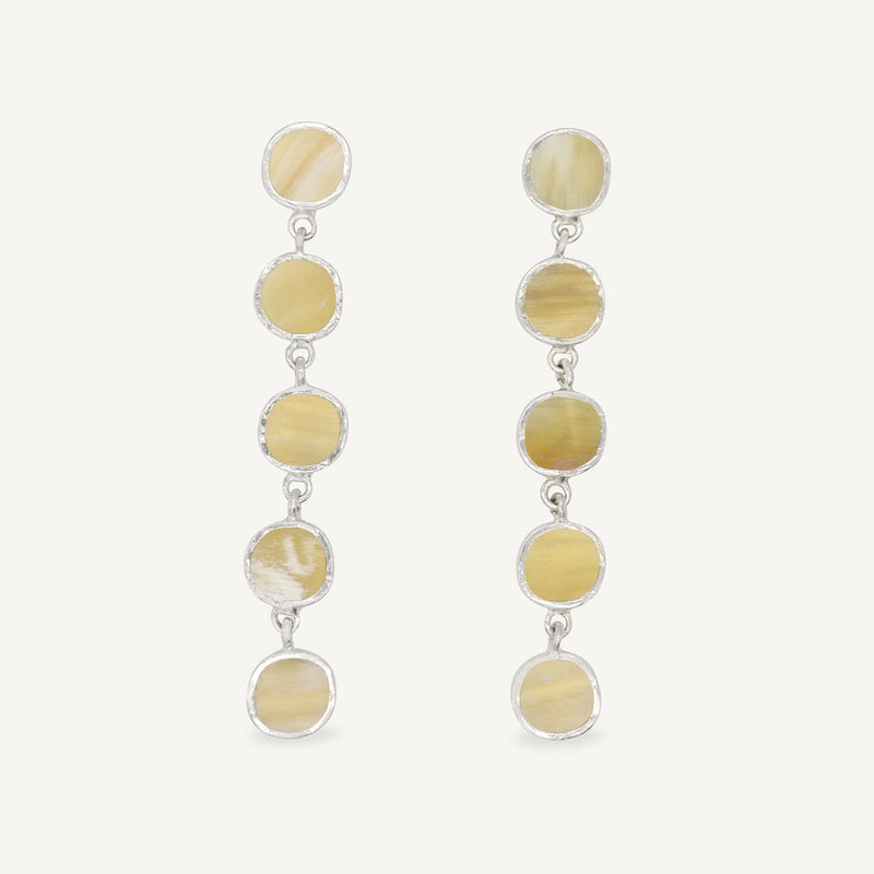 Sculptural statement silver drop earrings handcrafted by Robyn Smith for Folde Jewellery in London ethically handmade using recycled silver and highland horn.
