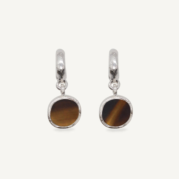 Sculptural statement silver hoop earrings handcrafted by Robyn Smith for Folde Jewellery in London ethically handmade using recycled silver and highland horn.