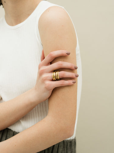 Arne and Armfelt Stacking Rings - handmade in London using recycled silver and plated in 18ct yellow gold.