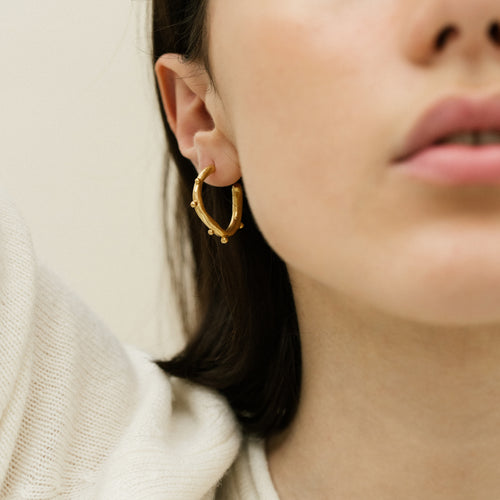 Arne Hoops - handmade in London using recycled silver and plated in 18ct yellow gold.