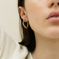 Arne Hoops - handmade in London using recycled silver and plated in 18ct yellow gold.