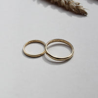 18ct Yellow Gold Wedding Rings pair | Womens and Mens wedding rings available in 9ct, 14ct, 18ct gold and platinum | Crafted from 100% recycled metals in south London with the philosophy that roughness and refinement can coexist