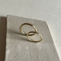 Armfelt wedding rings ethically made in 9ct yellow gold and inspired by artefacts and ancient antique jewellery | Womens and Mens wedding rings available in 9ct, 14ct, 18ct gold and platinum | Crafted from 100% recycled metals in south London with the philosophy that roughness and refinement can coexist