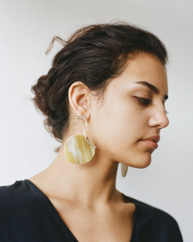 Akio Earrings handcrafted in silver featuring a piece of ethically sourced highland horn | statement silver jewellery where roughness and refinement coexist | handcrafted in London from 100% recycled silver