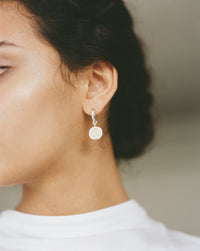 SOL Hoop Earrings handcrafted in silver featuring a piece of ethically sourced highland horn | statement silver jewellery where roughness and refinement coexist | handcrafted in London from 100% recycled silver