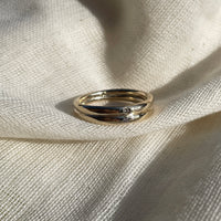 Double band 9ct yellow gold engagement ring with sustainably and ethically sourced round Ocean Diamonds| Womens and Mens signet rings available in 9ct, 14ct, 18ct gold and platinum | Crafted from 100% recycled metals in south London with the philosophy that roughness and refinement can coexist
