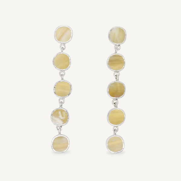 Sculptural statement silver drop earrings handcrafted by Robyn Smith for Folde Jewellery in London ethically handmade using recycled silver and highland horn.